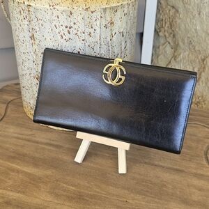 Gucci Black Leather Wallet with Gold Emblem